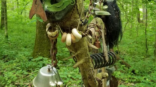 hanging shrine with masks